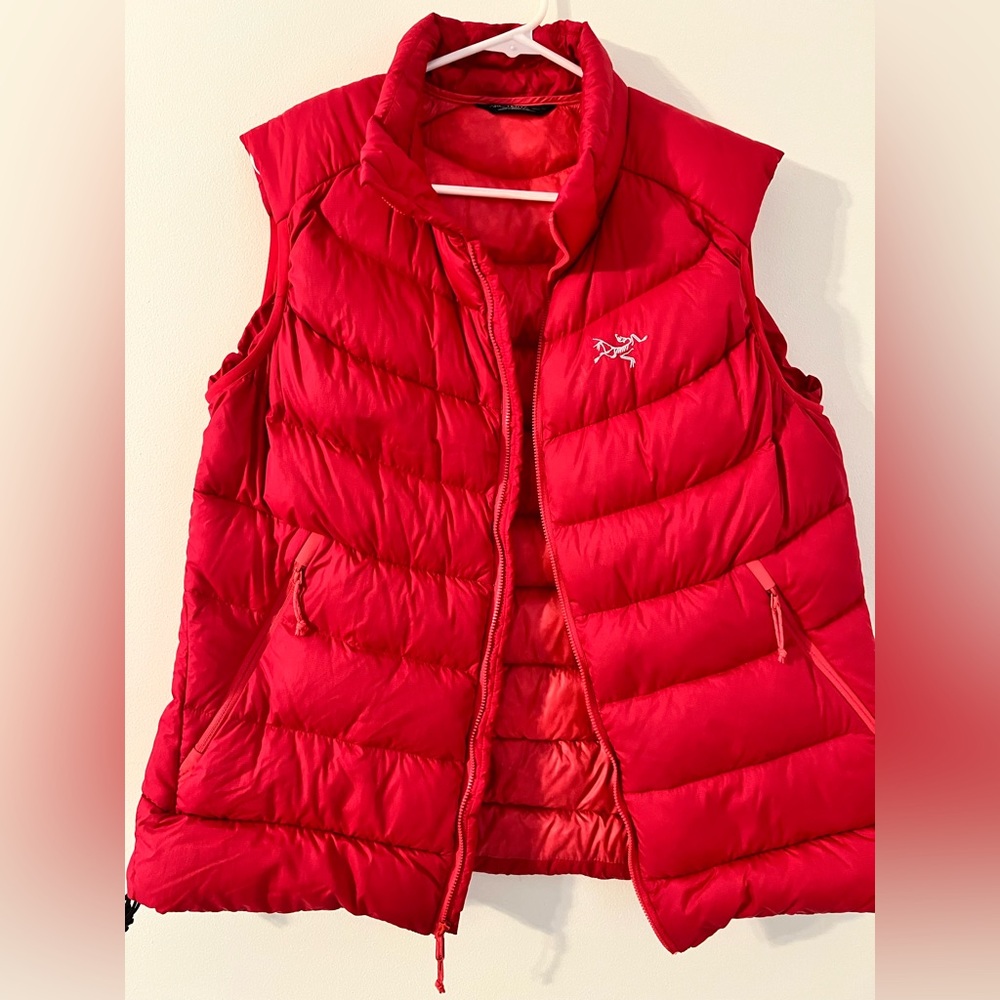 Deep pink Arcteryx packable vest